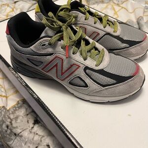 New Balance Gray Sneakers with Red and Yellow Accents